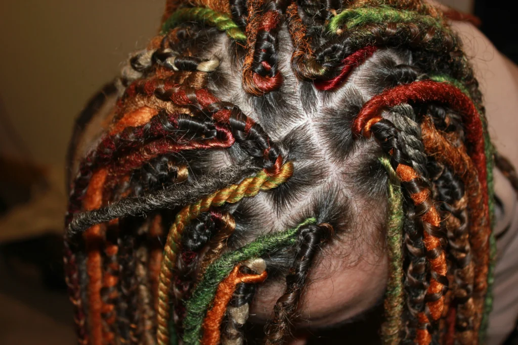 Curly human braiding hair styled in box braids